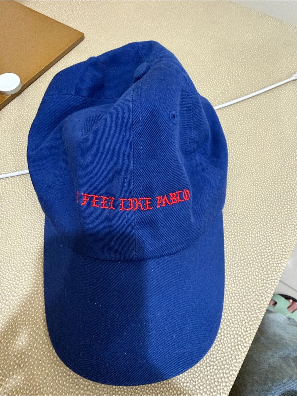 Blue Cap with Red Embroidered Text